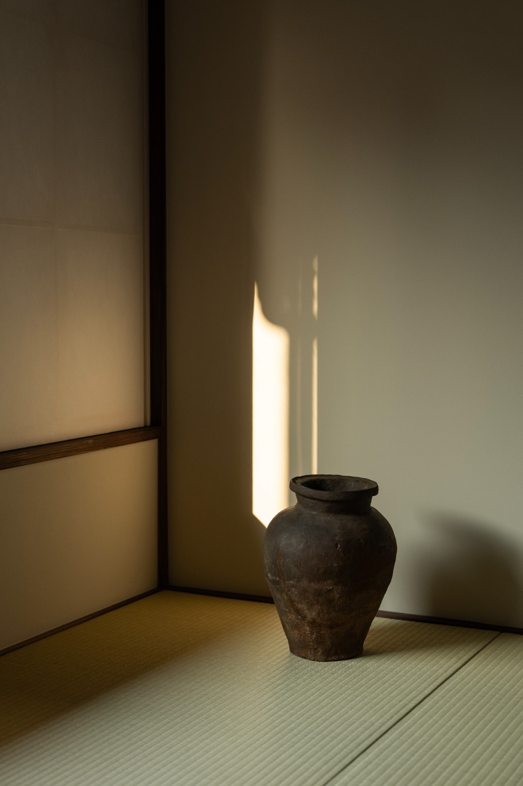 Handcrafted straw object in a quiet interior